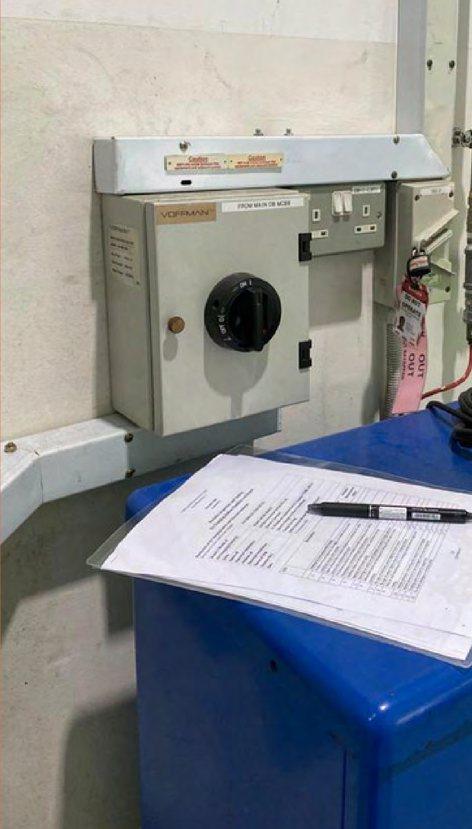 Isolator and inspection checklist at the Wave 9 EV charging workshop